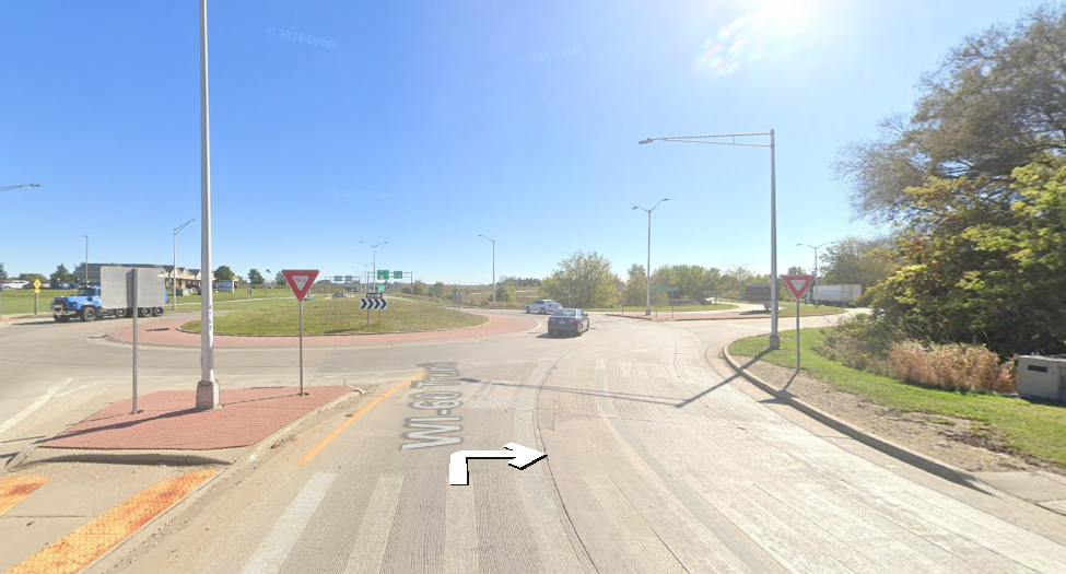 At the traffic circle, continue straight to stay on WI-60 Trunk E